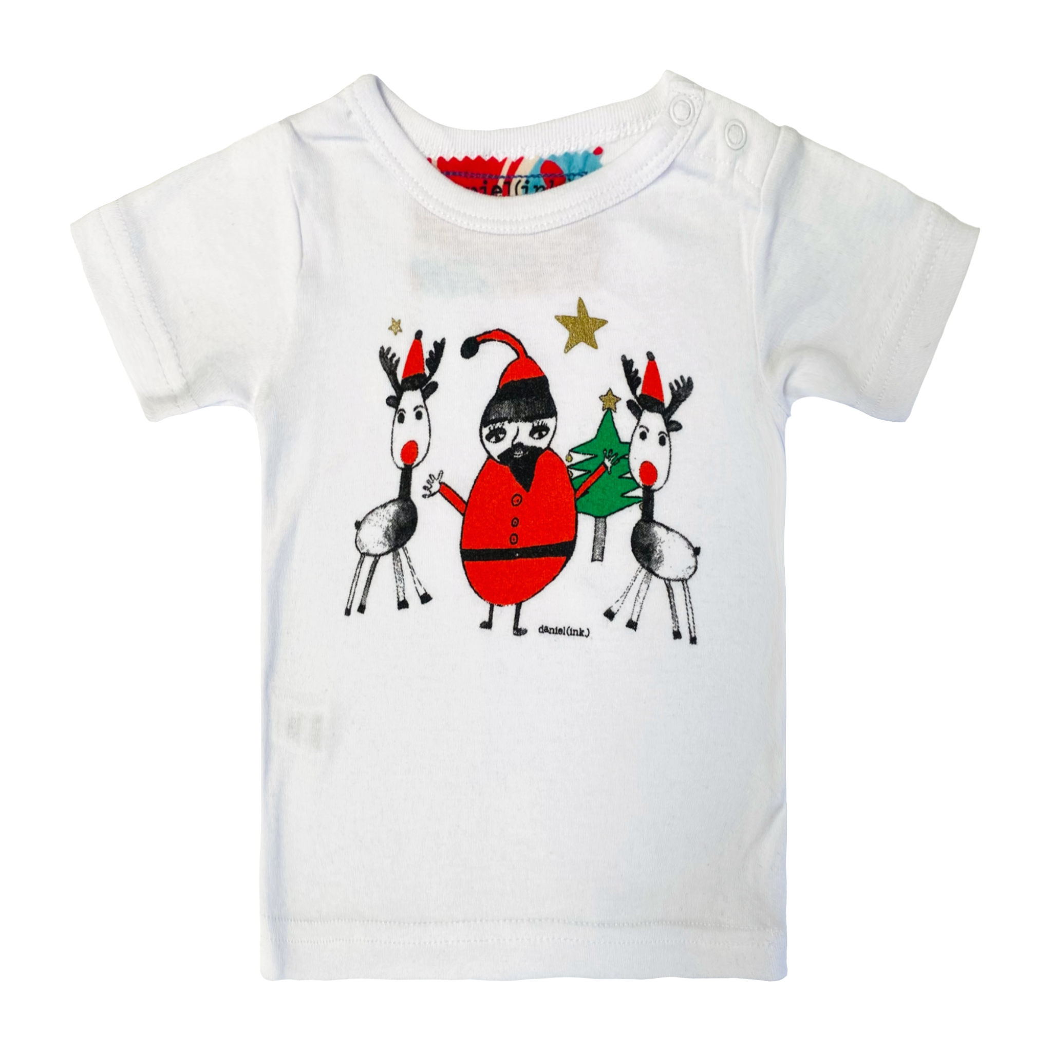 White, short sleeve babies' t-shirt featuring a hand drawn sketch of Santa Claus standing with two reindeer in front of a Christmas tree. Santa Claus is wearing his signature red outfit and the two reindeer either side of him are in red pointy Santa hats. This t-shirt has a red, white, and blue fabric label on the back of the neck and has two white press studs on the left shoulder.