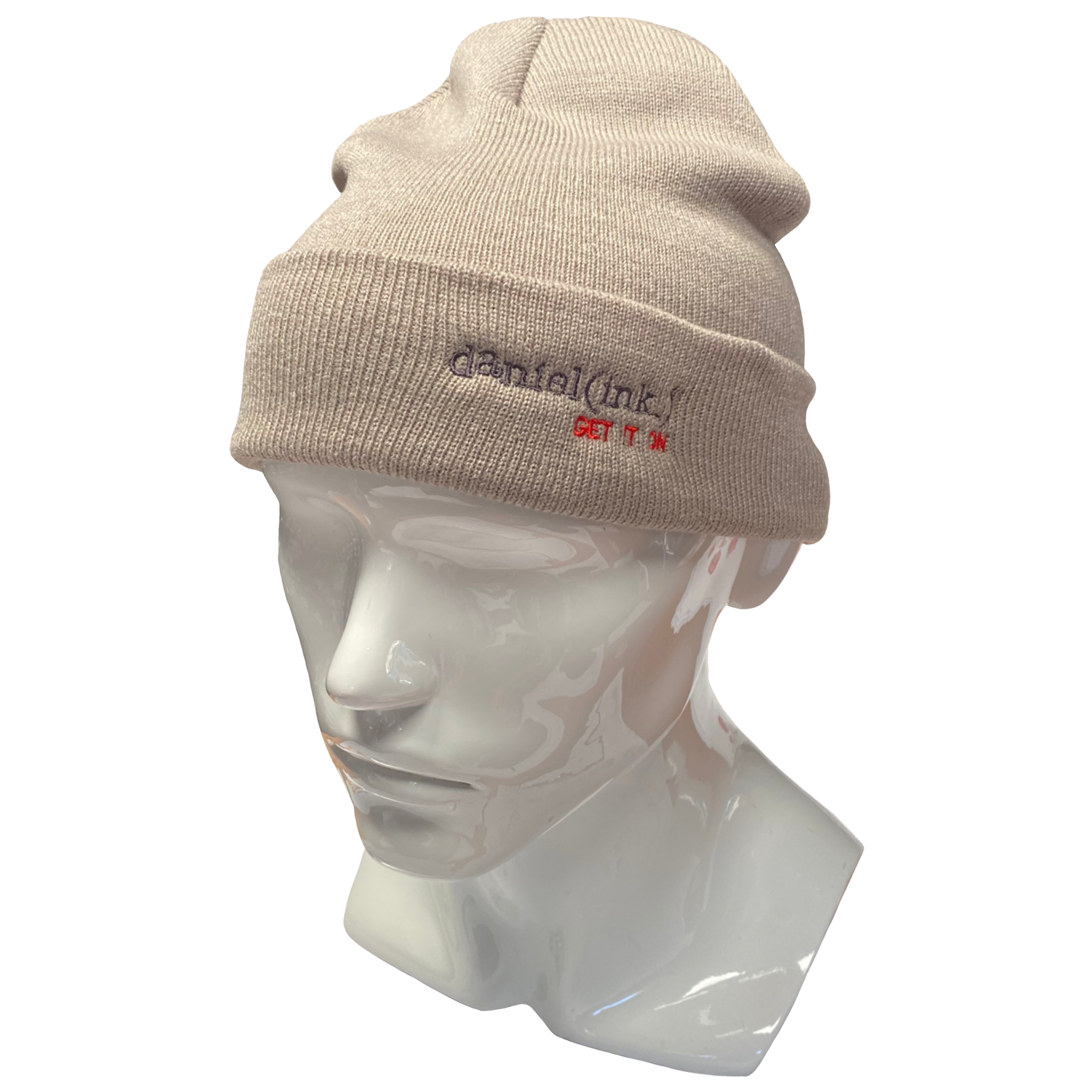 Cuff beanie in a mushroom colour with the daniel(ink.) logo embroidered on the cuff in dark silver and red.