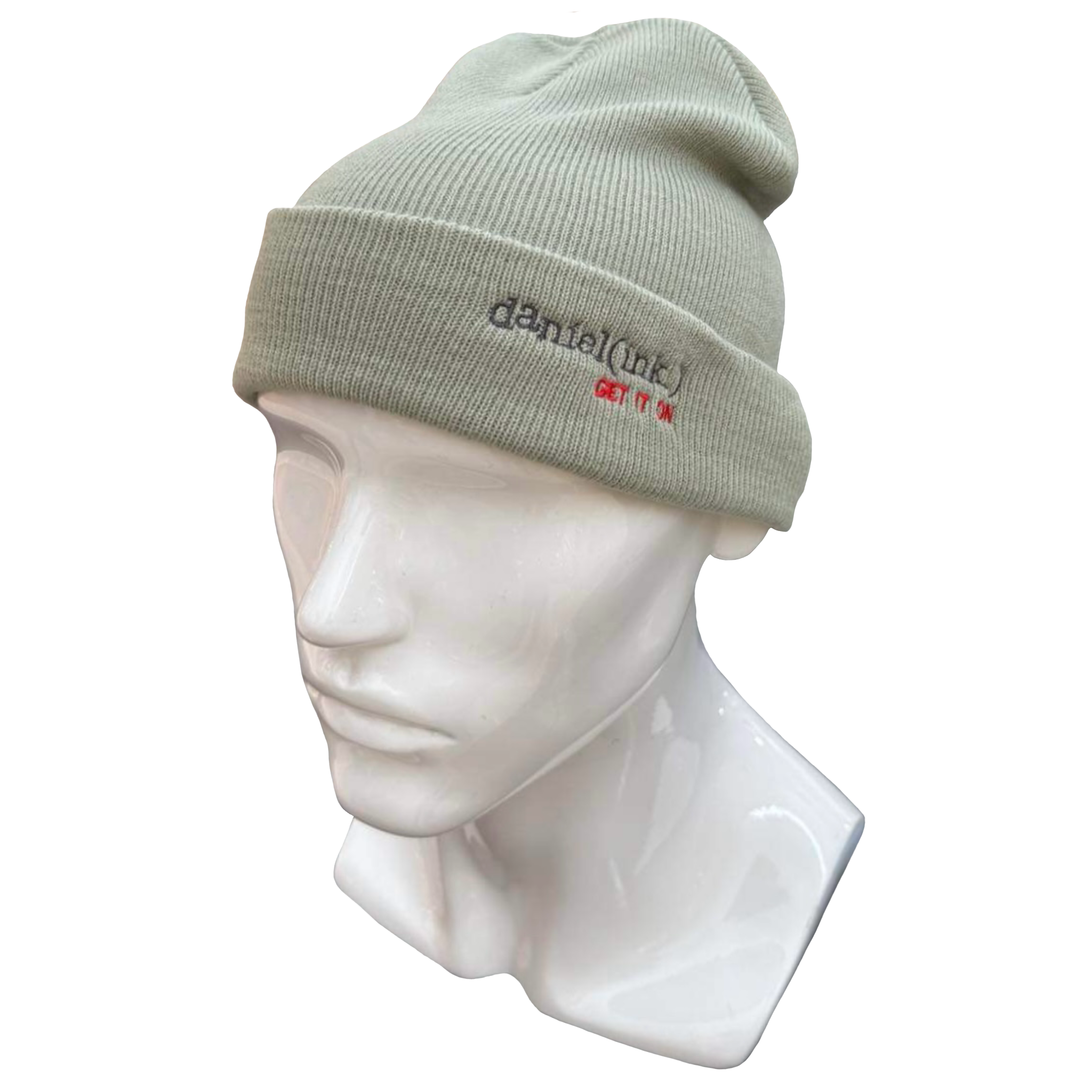 Cuff beanie in a pistachio colour with the daniel(ink.) logo embroidered on the cuff in dark silver and red.