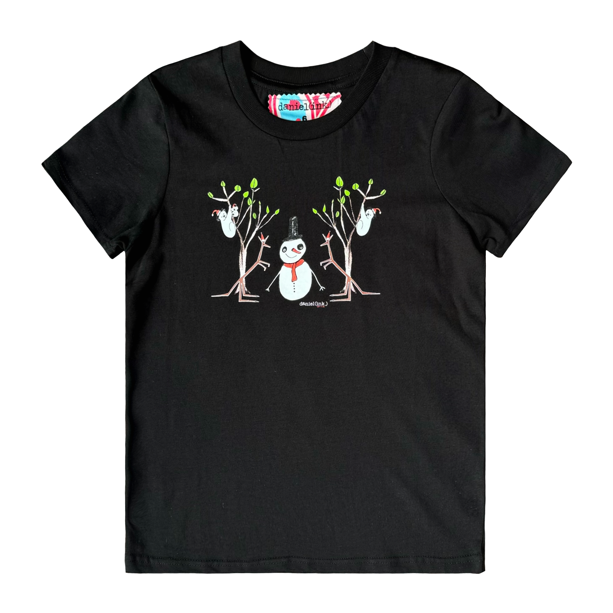 Black kids' t-shirt featuring a hand drawn image of a snowman standing in between two kangaroos and in front of two large gum trees. The snowman is wearing an orange scarf and black top hat and the kangaroos are both wearing pointy Santa hats. The gum trees both have koalas wearing Santa hats in them. This t-shirt has a red, white, and blue fabric label on the back of the neck.