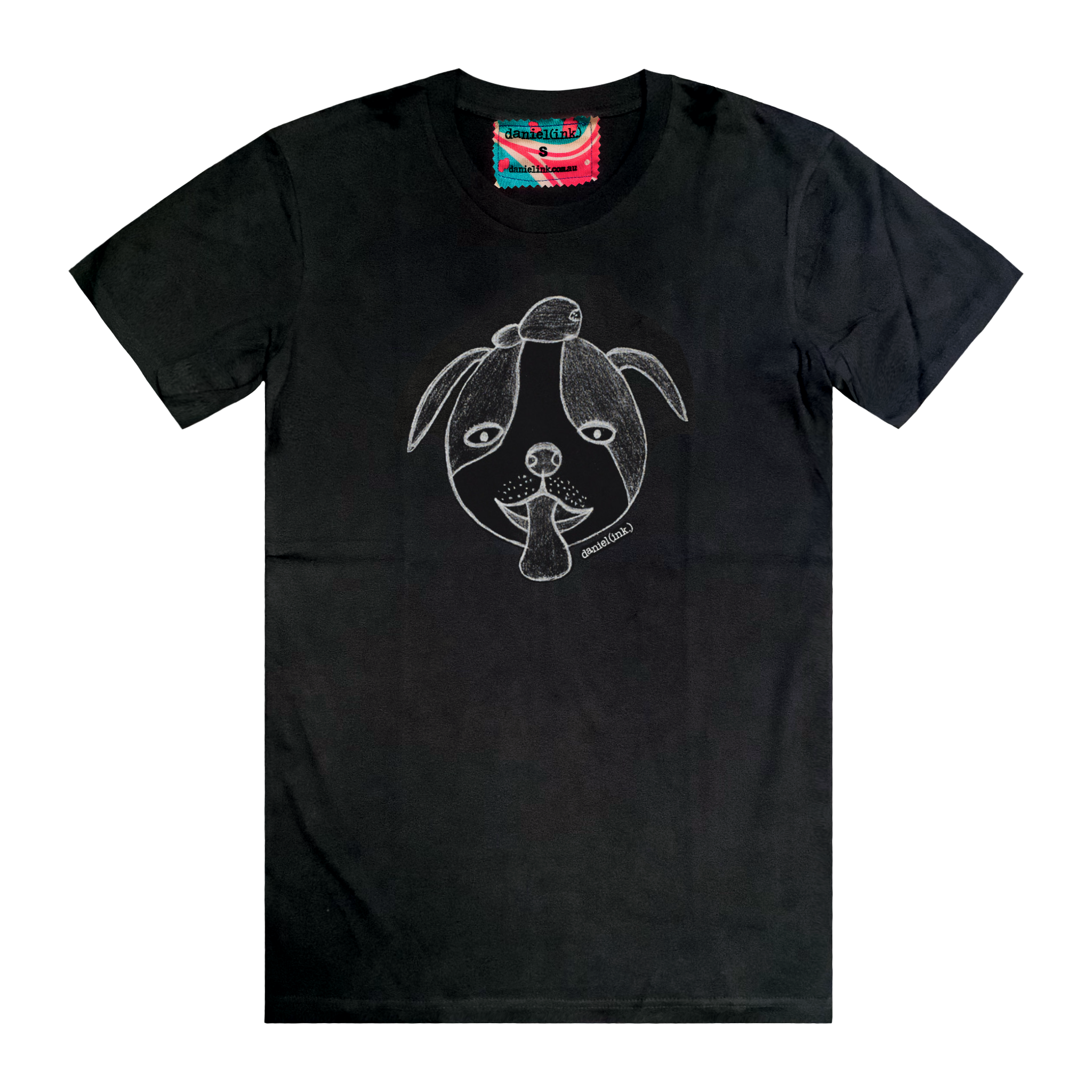 Black short sleeve men's t-shirt featuring a hand drawn sketch of a dog’s face in white. The dog has a round head, floppy ears, wide eyes, and its tongue is sticking out. The t-shirt has a red, white, and blue fabric label on the back of the neck.