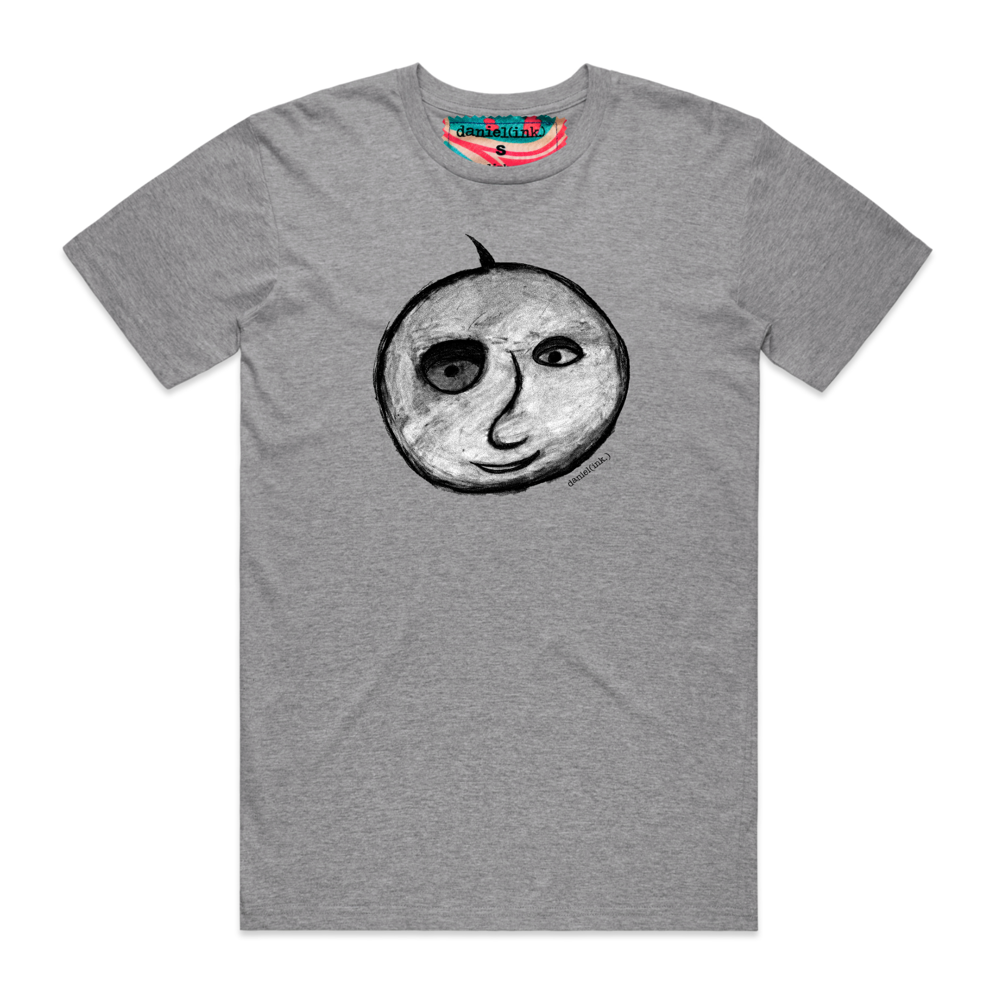 Grey short sleeve men's t-shirt featuring a hand drawn charcoal sketch of an apple with a face in black and white. The t-shirt has a red, white, and blue fabric label on the back of the neck.