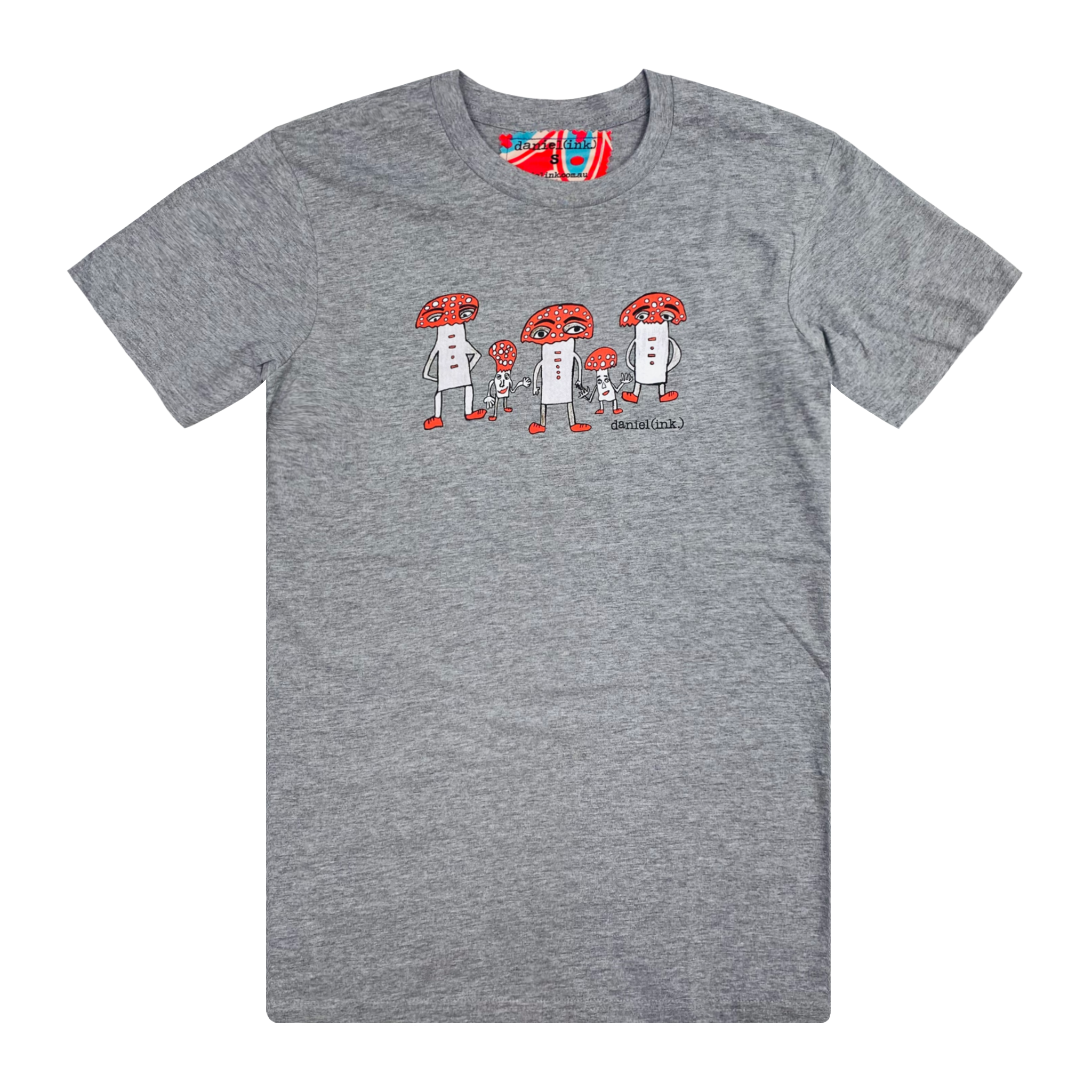 Men's grey t-shirt featuring a hand drawn image of five humanoid mushroom figures, three large and two small, standing next to each other. Each mushroom figure has a red mushroom cap, red shoes, and red accents. The three large mushrooms also have red buttons on their chests which spell "magic" in Morse code. This t-shirt has a red, white, and blue fabric label on the back of the neck.