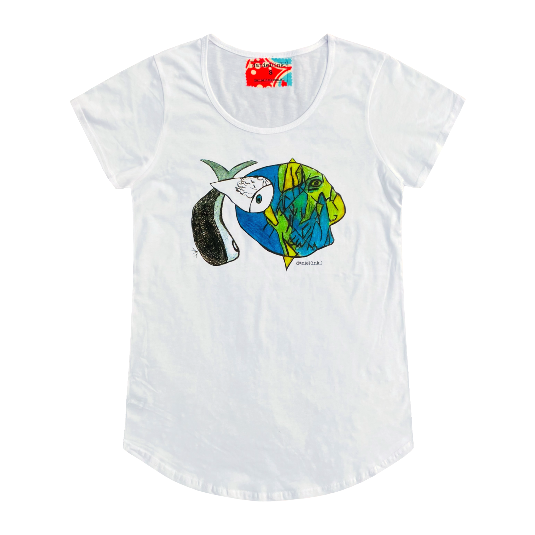 Women's white t-shirt featuring an abstract drawing of three fishes swimming together. The design features a large yellow, green, and blue fish on the right; a small grey fish in the middle; and another larger grey and white fish on the left. This t-shirt has a red, white, and blue fabric label on the back of the neck.