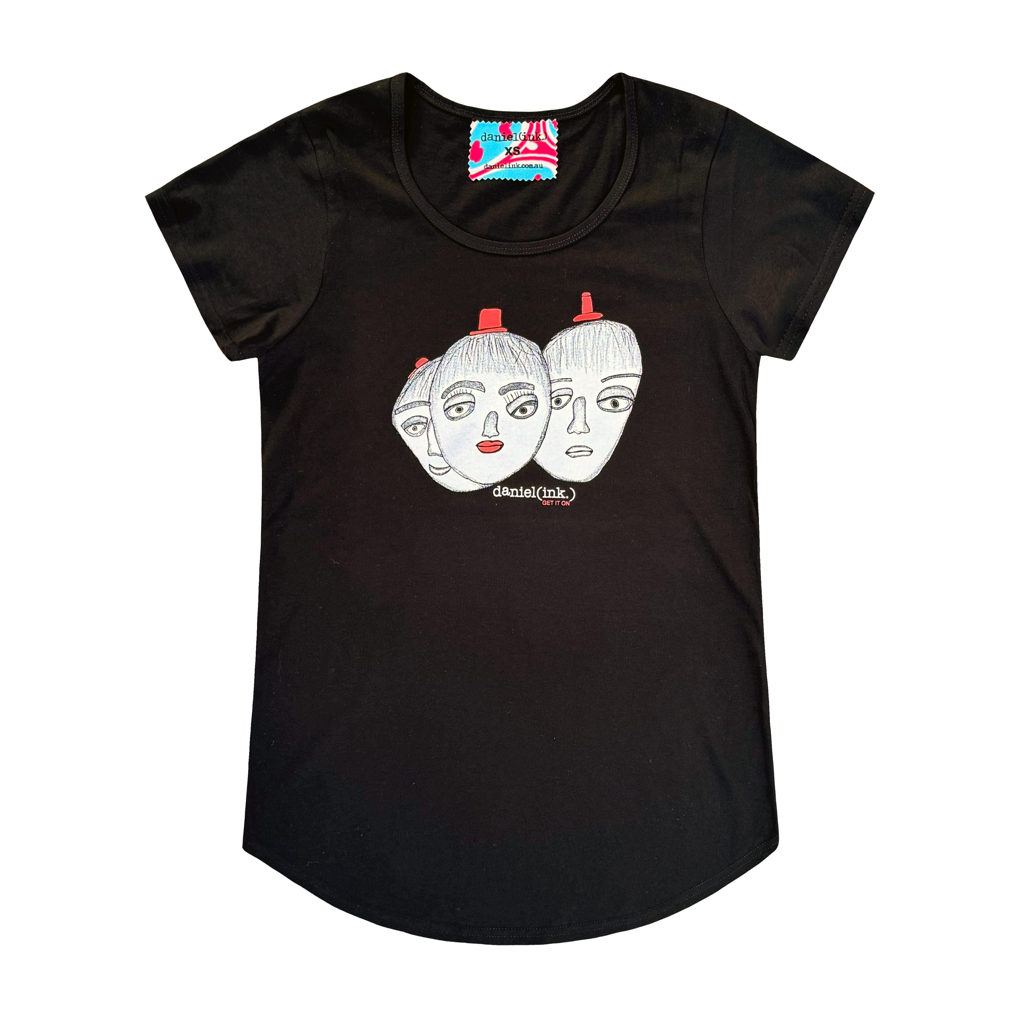 Women’s black t-shirt featuring a hand drawn sketch of three faces merged together. The three faces have red hats and the face in the middle has red lips. This t-shirt has a red, white, and blue fabric label on the back of the neck.