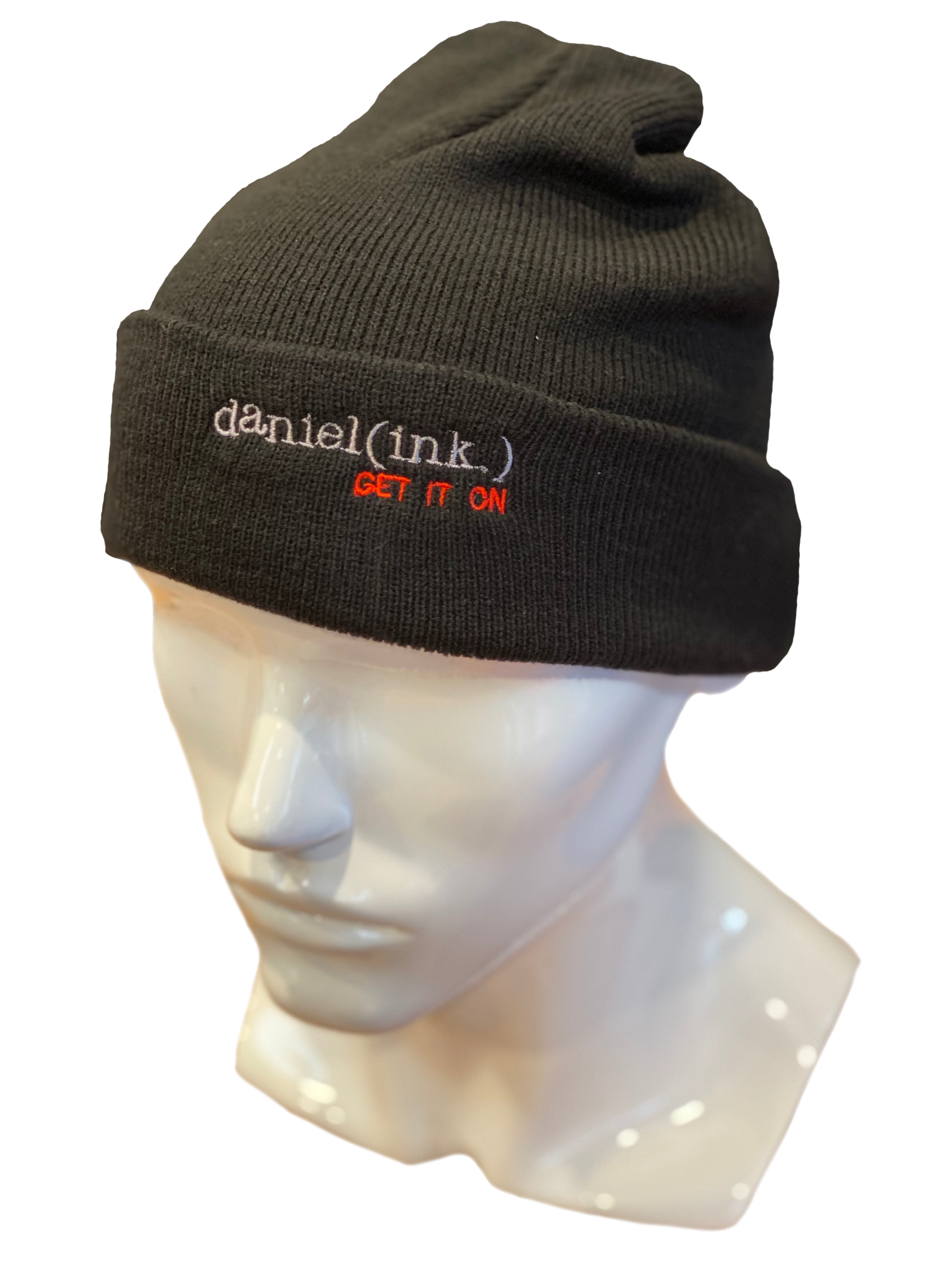 Cuff beanie in black with the daniel(ink.) logo embroidered on the cuff in dark silver and red.