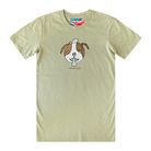 Men's pistachio colour t-shirt featuring a hand drawn sketch of a dog’s face in brown and white. The dog has a round head, floppy ears, wide eyes, and its tongue is sticking out. The t-shirt has a red, white, and blue fabric label on the back of the neck.