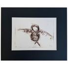 Black pencil sketch of an owl on white backing board with a black frame. 